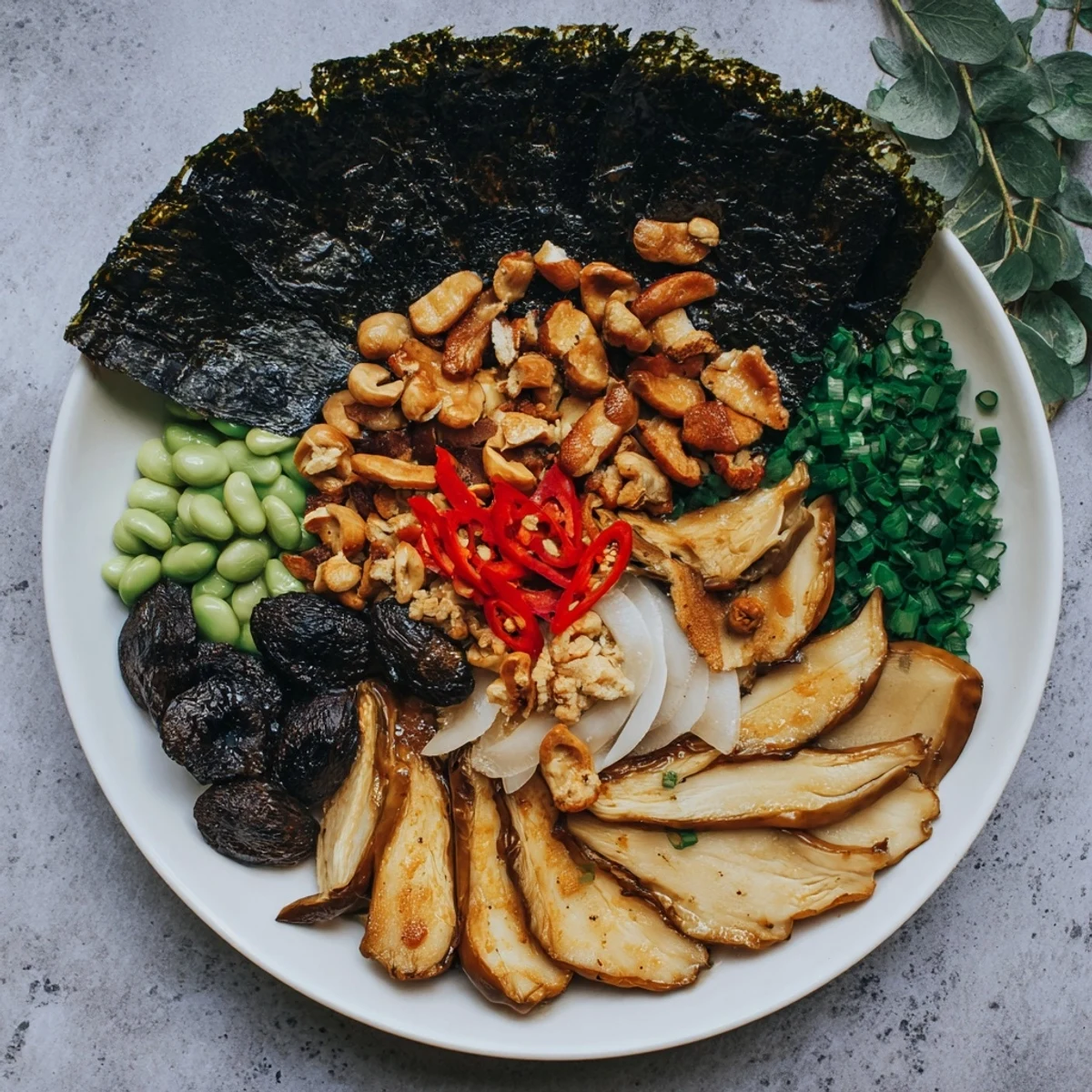 The savory Umami Bomb Asian Delight offers an appetizing array of textures and flavors on a lovely serving board.