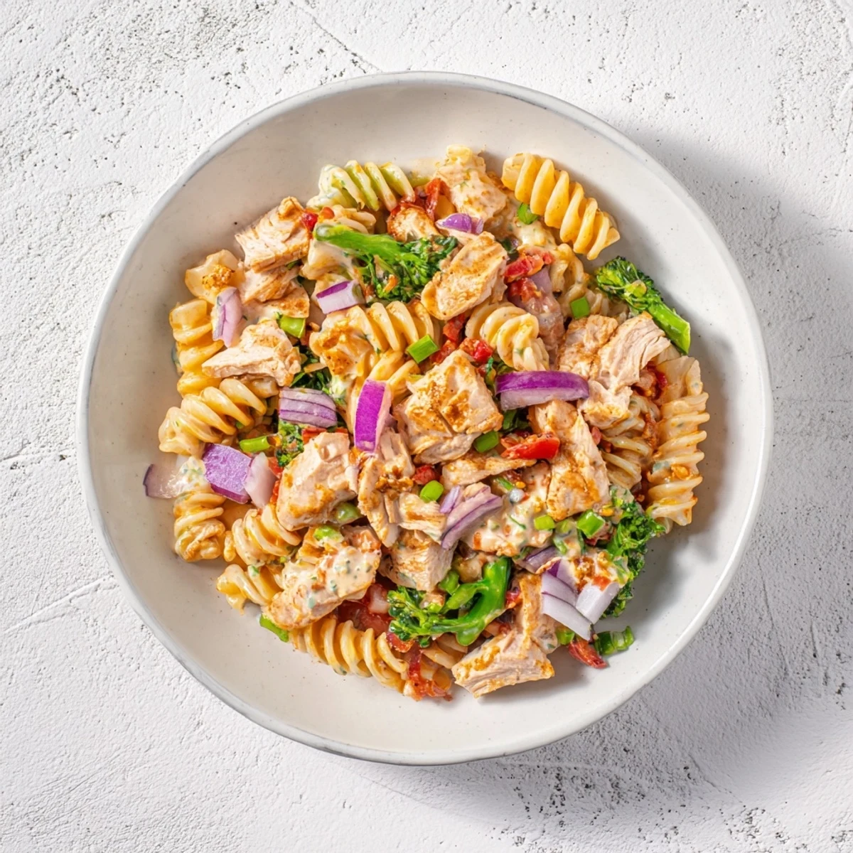 This Southern classic Chicken Macaroni Holiday Salad features a creamy, mustardy dressing poured over pasta.