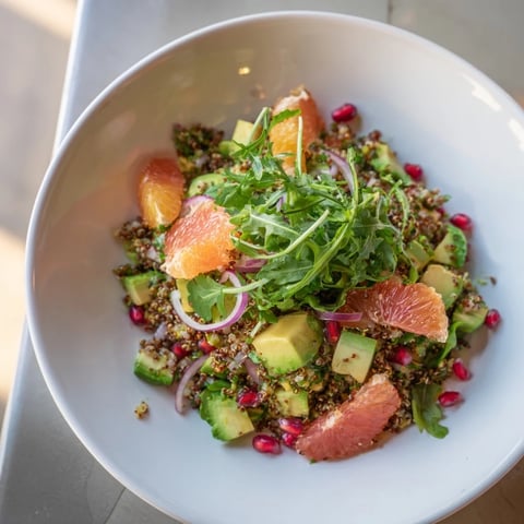 Fresh Citrus & Avocado Quinoa Bowl with bright orange segments and creamy avocado, ready to serve.